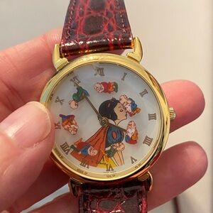 Snow White and the Seven Dwarfs watch. A small chunk is missing from face.